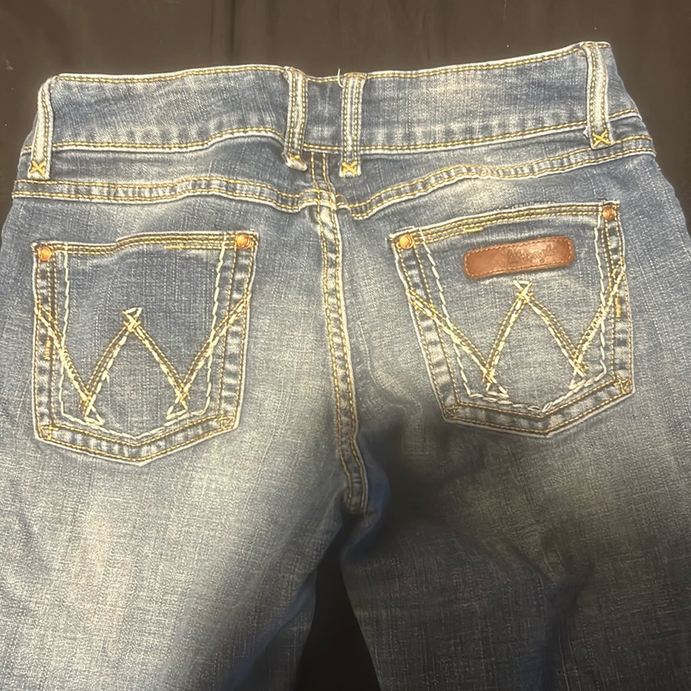 Woman’s wrangler jeans size 5x34 never worn fit tight